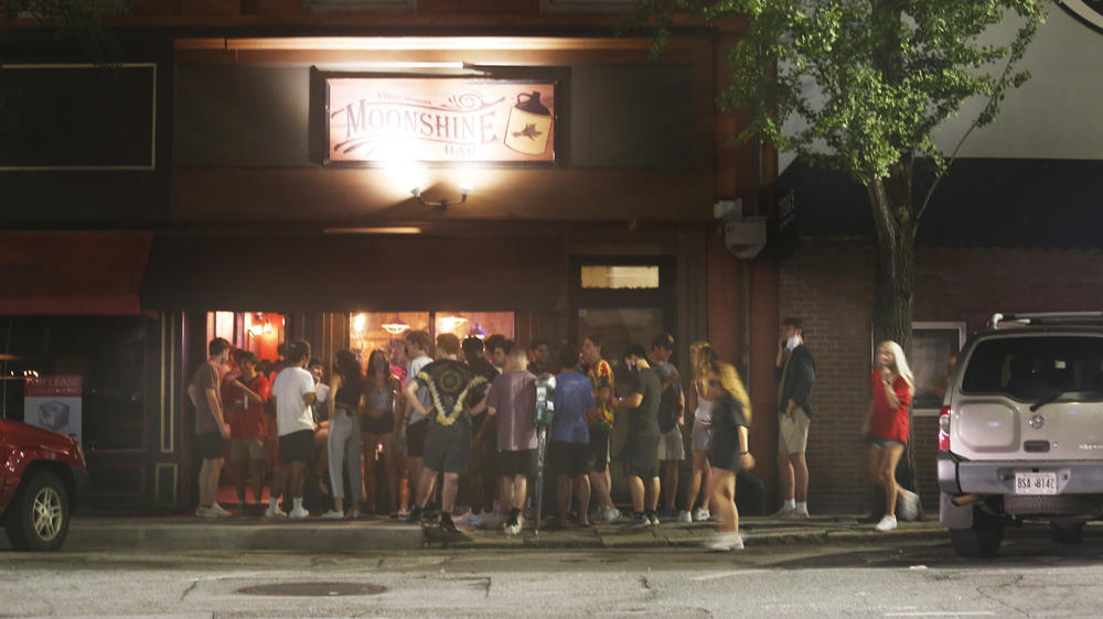 On Monday night at around 11 p.m., the bar strip in downtown Athens was overflowing with students, most not wearing masks