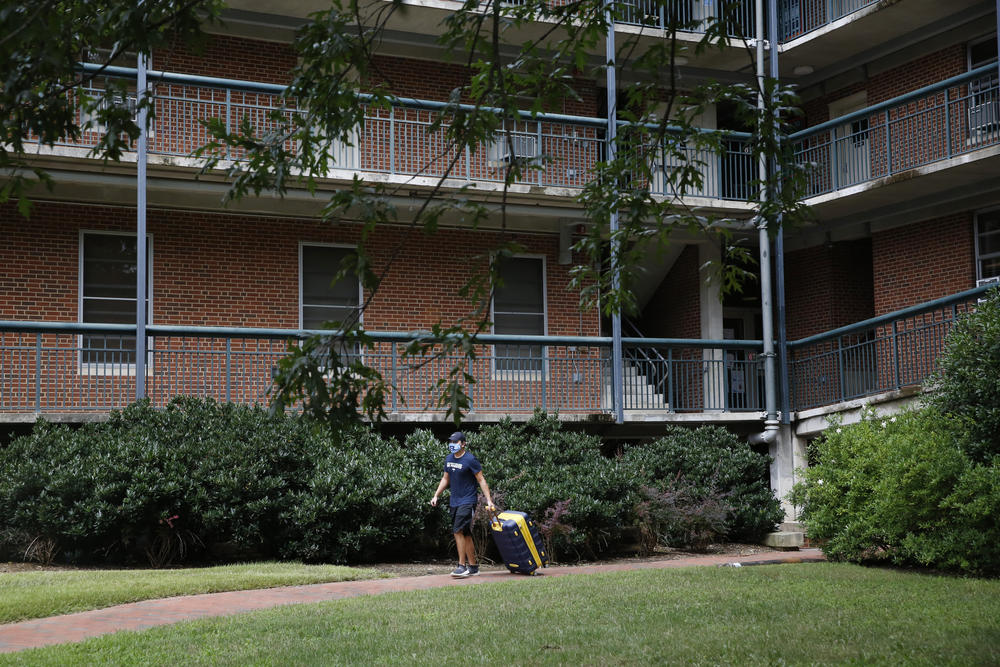 Students move out of UNC dorms after multiple coronavirus clusters forced the university to go online-only.