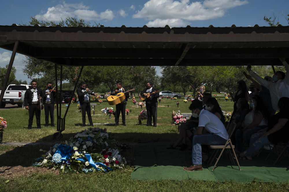 El Mariachi Continental plays during a funeral service at a cemetery in Donna.