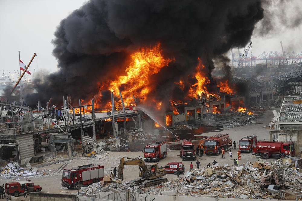 A huge fire burns Thursday at Beirut's port, triggering panic among residents traumatized by last month's massive explosion that killed nearly 200 people and injured thousands.