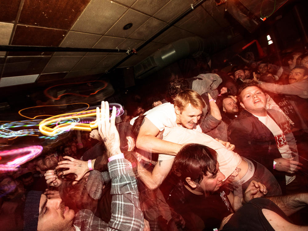 Crowdsurfing during a Drug Church show at Great Scott in 2018.