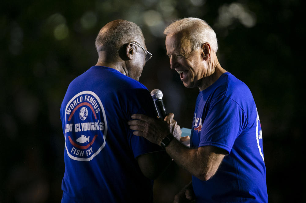 Former U.S. Vice President Joe Biden greets House Majority Whip James Clyburn during a fish fry event in Columbia, S.C. on June 21, 2019.