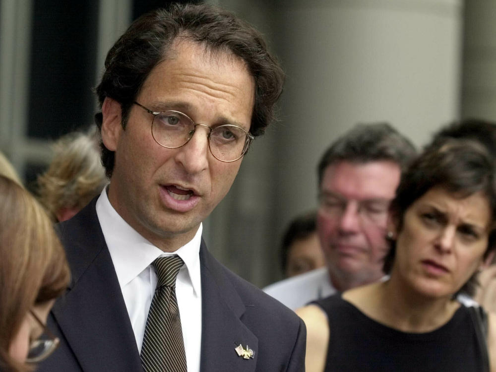 Prosecutor Andrew Weissmann talked with reporters outside the federal courthouse in Houston in 2002. His new book reflects on the past and potential future of the Justice Department.