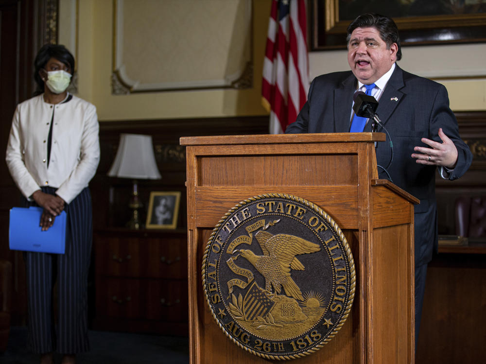 Illinois Gov. JB Pritzker answers questions from the media, along with Dr. Ngozi Ezike, director of the Illinois Department of Public Health, during his daily press briefing on the COVID-19 pandemic on May 22, in Springfield, Ill.