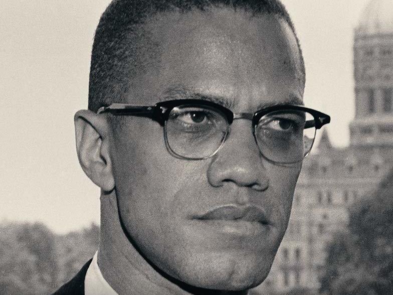 malcolm x with glasses