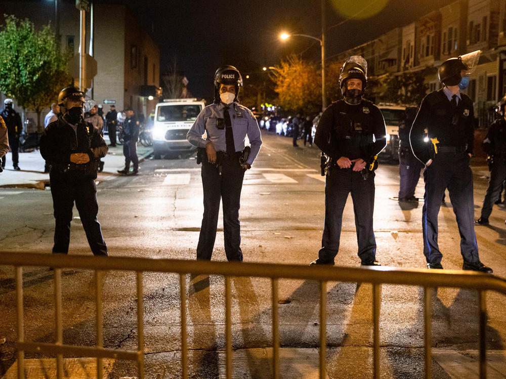 Police line up in Philadelphia on Oct. 28 following two nights of protesting and unrest after the fatal shooting of Walter Wallace Jr. by police. Philadelphia was among the cities approving oversight measures.