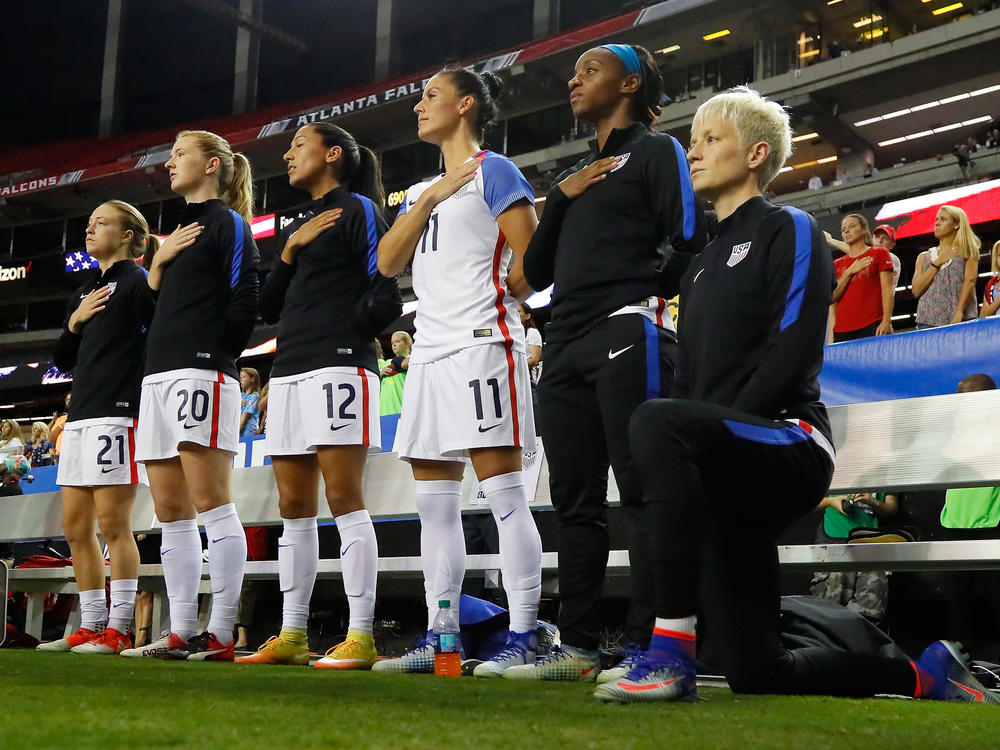Megan Rapinoe kneels during the National Anthem prior to the match between the United States and the Netherlands in Atlanta, Ga., on Sept. 18, 2016.
