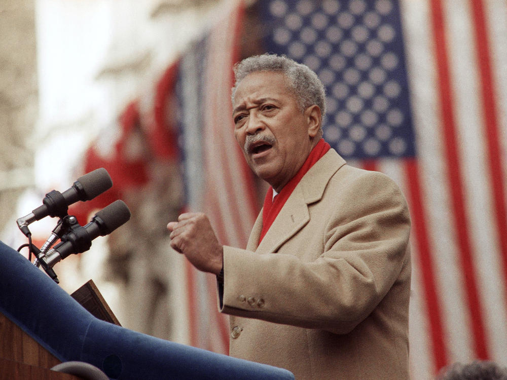 David Dinkins delivers his first speech as mayor of New York in 1990. Dinkins, New York City's first Black mayor, died Monday at 93.