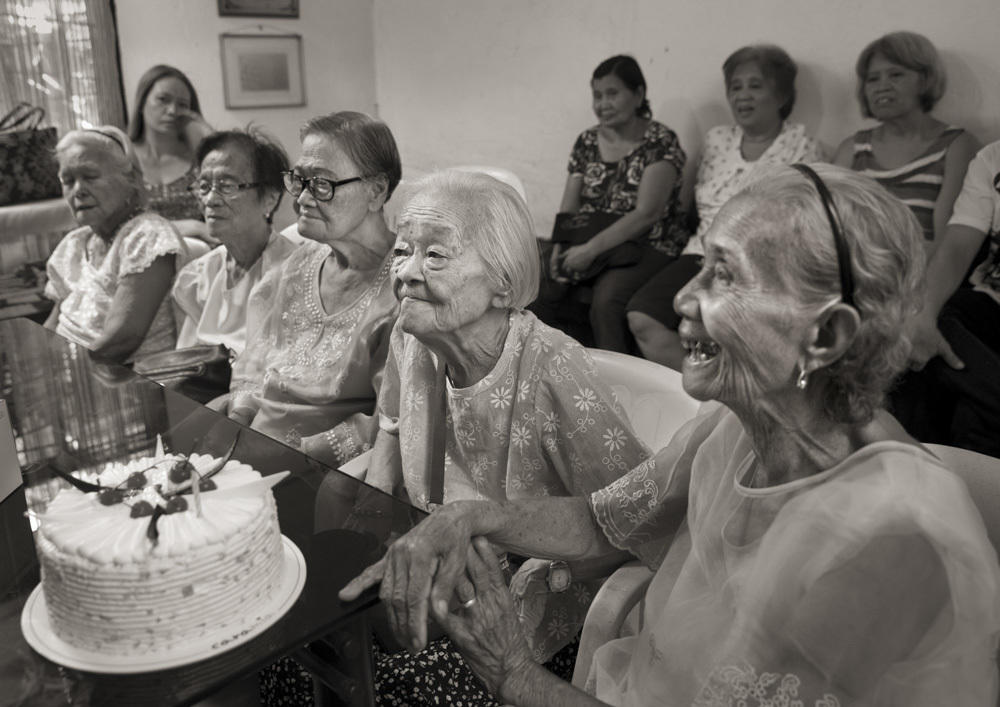 Felicidad delos Reyes (from left), Estela Adriatico, Estelita Dy, Remedios Tecson and Narcisa Claveria celebrate Tecson's and Dy's 89th birthdays on April 27, 2019, at the offices of Lila Pilipina — the League of Filipino Women. Delos Reyes died on Feb. 1, 2020.