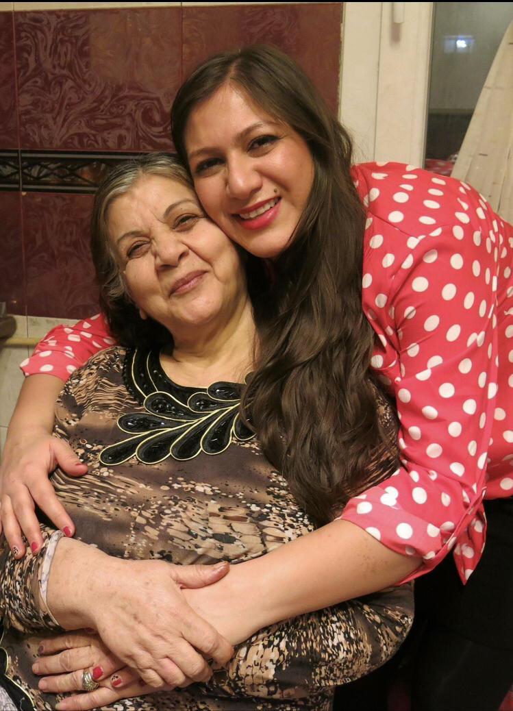 Katayoon Beshkardana (shown here with her mother) has not seen her family in Iran since 2015. She is studying for a doctorate degree in Washington, D.C.