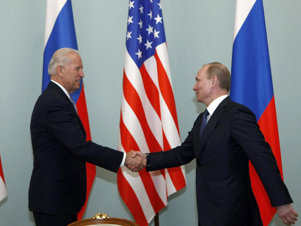 Putin, then Russia's prime minister, greets Biden, then vice president, in Moscow in March 2011. Biden has said he once told Putin he looked into his eyes and didn't see a soul.