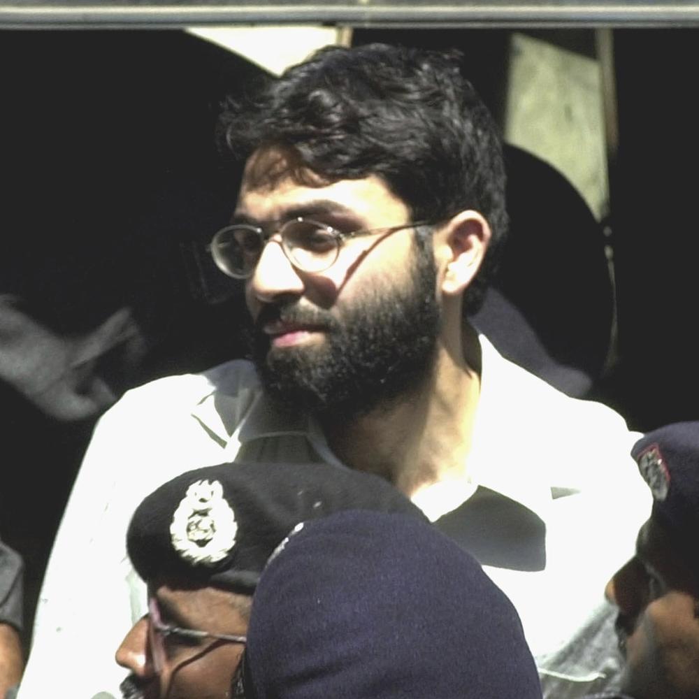 The man charged with the kidnapping and murder of journalist Daniel Pearl arrives at a Karachi, Pakistan, court in 2002. Ahmed Omar Saeed Sheikh had his murder conviction overturned this year and was ordered released.