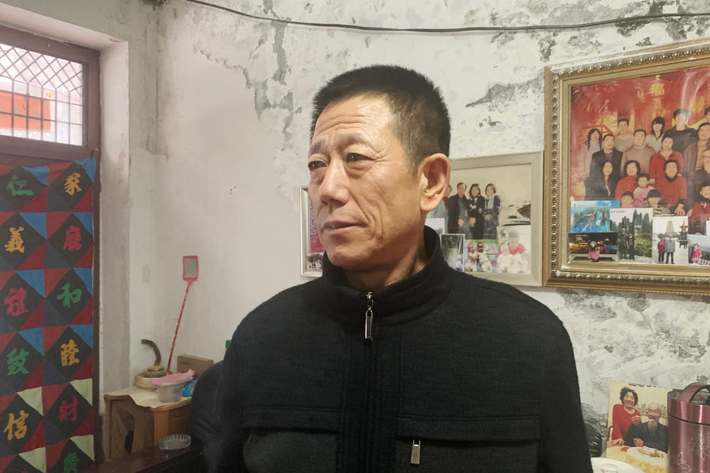 Zhang Shuangshan, a security guard at Juxin Mining. He was sentenced to 5 1/2 years in prison. He alleged local police repeatedly beat him during an interrogation to force him to testify against his old boss, Zhang Zhixiong.