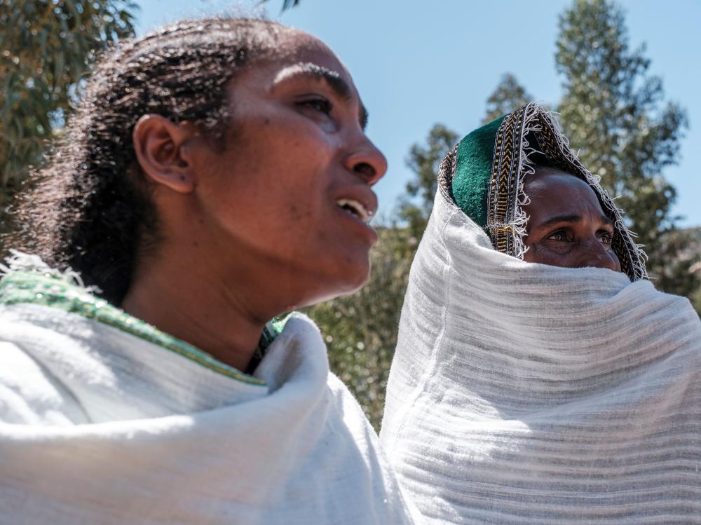 Women mourn the victims of a massacre allegedly perpetrated by Eritrean soldiers in the village of Dengelat, north of Mekele, the capital of Tigray.