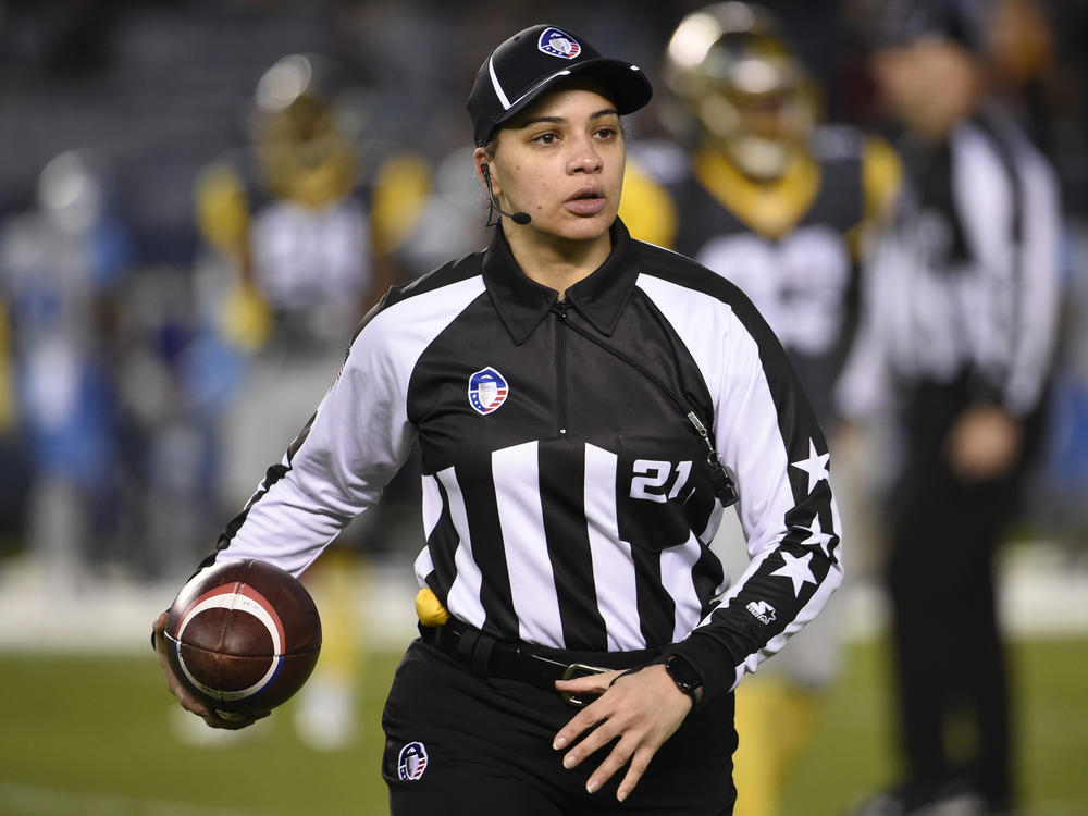 Maia Chaka, shown here officiating an Alliance of American Football game in 2019, has been named the NFL's first Black female official.
