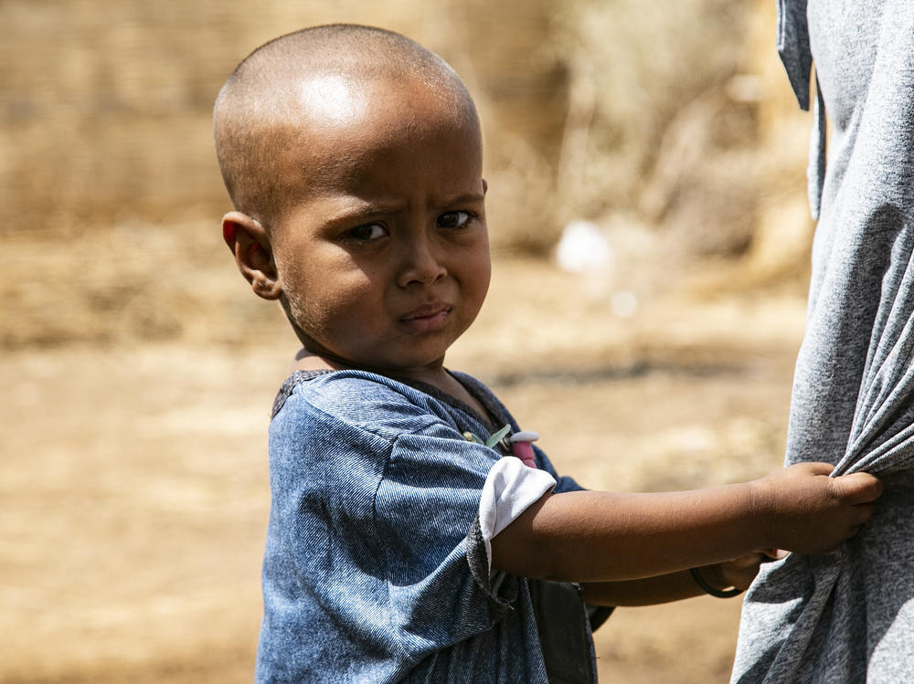 An Ethiopian child is seen at Um Rakuba refugee camp in February as those fleeing the conflict in Tigray continue to live under harsh conditions.
