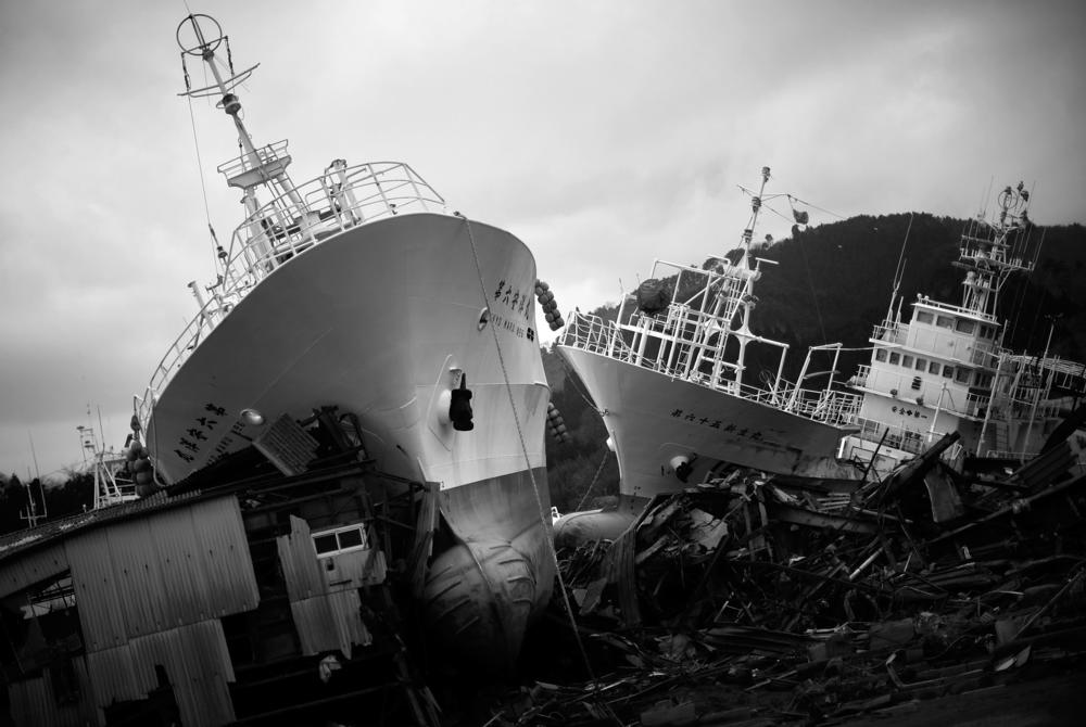 Fishing ships are stacked like toys hundreds of yards from the harbor waters in Kesennuma, Miyagi Prefecture, on March 22, 2011.