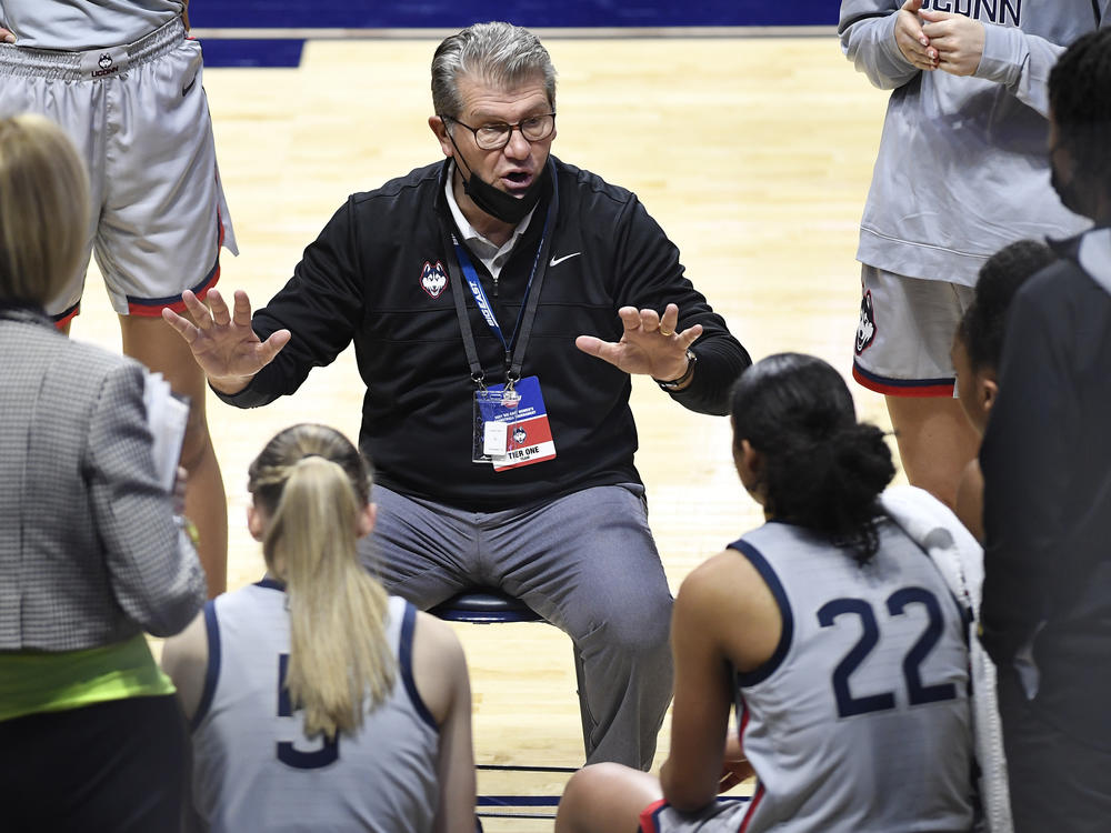 Connecticut head coach Geno Auriemma talks to his team during a game against Villanova in the Big East tournament on March 7, 2021. Auriemma has tested positive for the coronavirus.