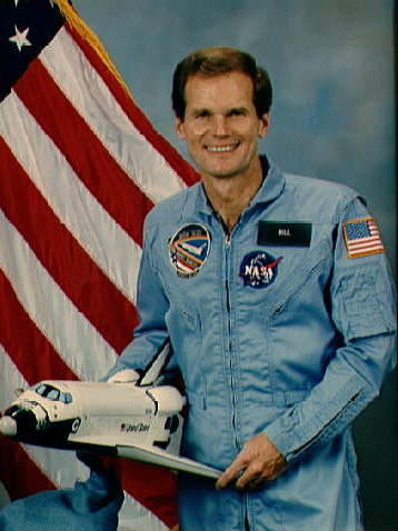 Nelson, shown in his official NASA portrait, flew aboard the space shuttle Columbia in 1986.