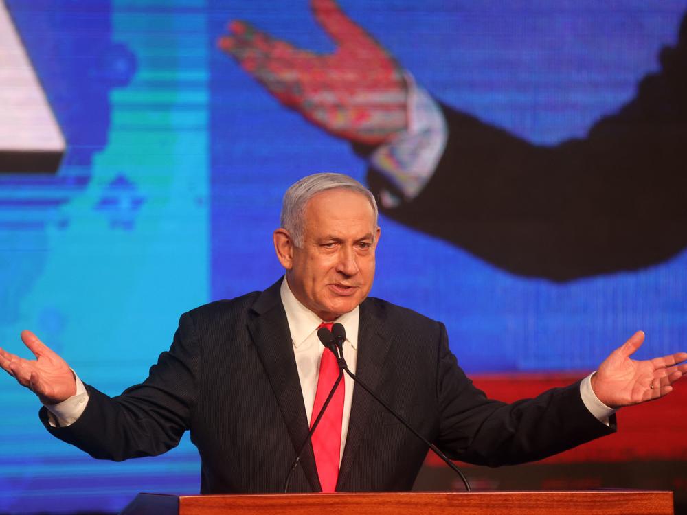 Israeli Prime Minister Benjamin Netanyahu, leader of the Likud party, addresses supporters at the party campaign headquarters in Jerusalem early Wednesday after the end of voting in the fourth national election in two years.