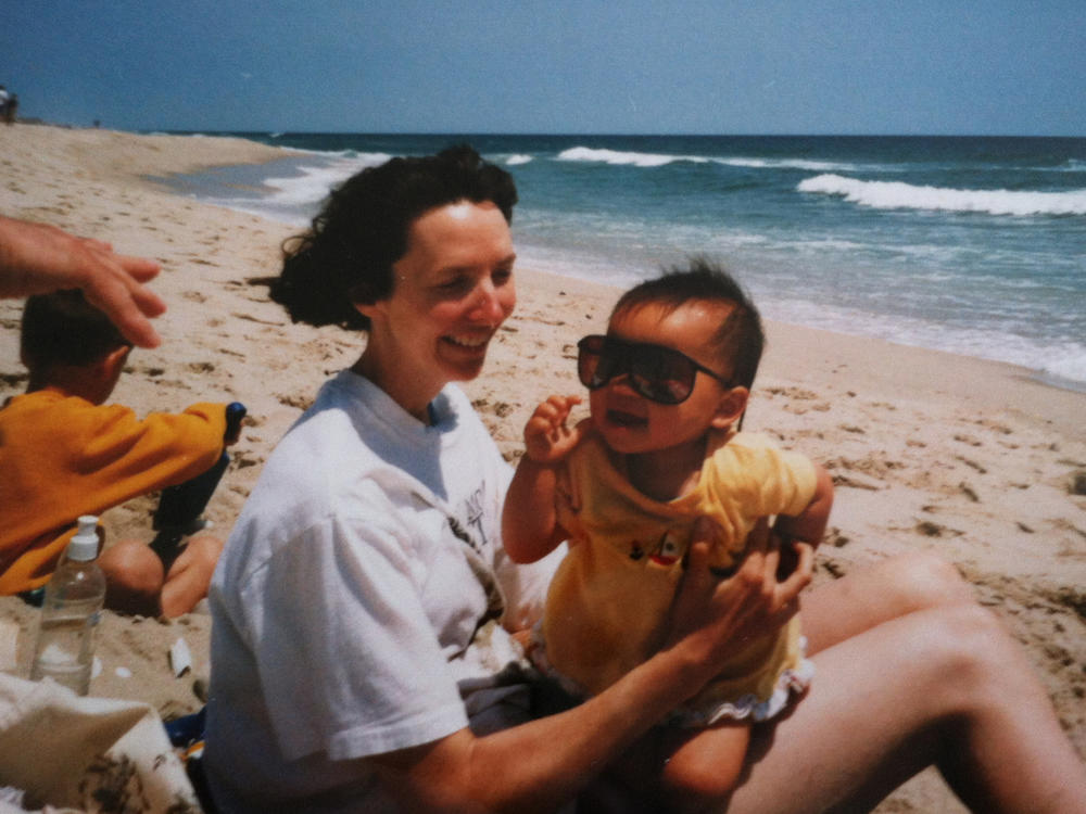 Emma LeMay, now 22, with her mother at the Jersey shore. LeMay, adopted from Chongqing China, was raised in Vermont and now lives in Atlanta.