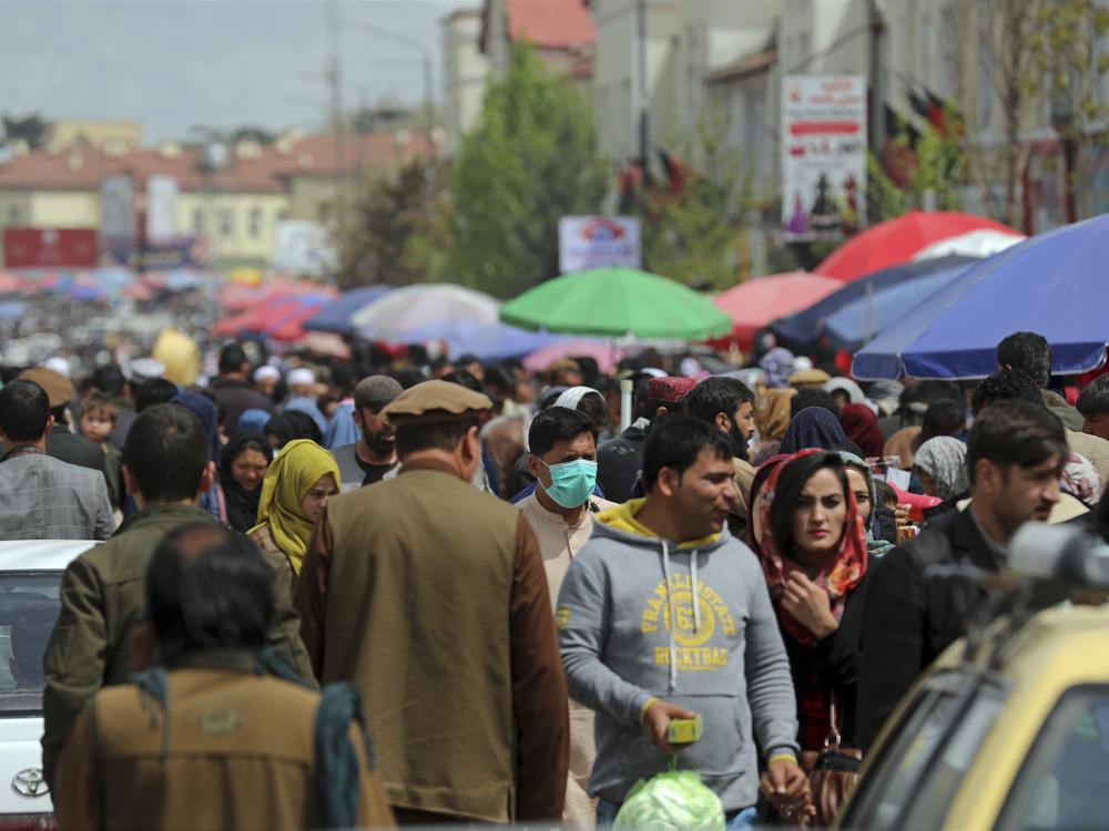 Crowds at a street market in Kabul in April.