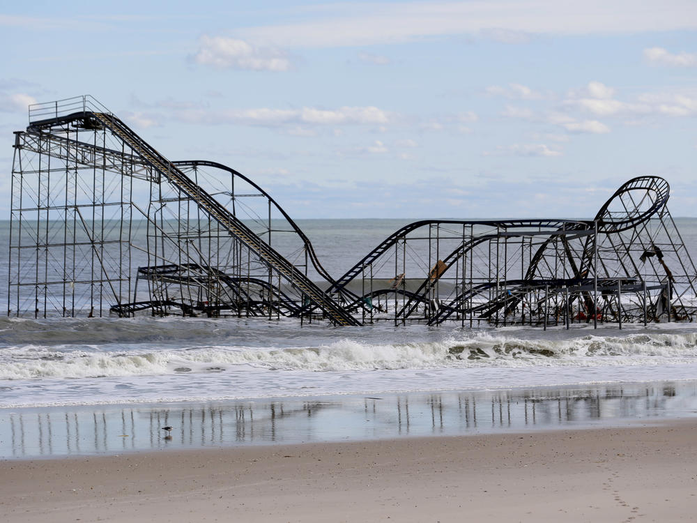 A roller coaster that once sat on the Funtown Pier in Seaside Heights, N.J., rests in the ocean on Oct. 31, 2012, after the pier was washed away by Hurricane Sandy.
