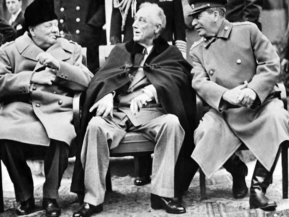 British Prime minister Winston Churchill (left), President Franklin D. Roosevelt and USSR Secretary General of the Soviet Communist Party Joseph Stalin pose at the start of the Conference of the Allied powers in Yalta, Crimea, on Feb. 4, 1945 at the end of World War II.