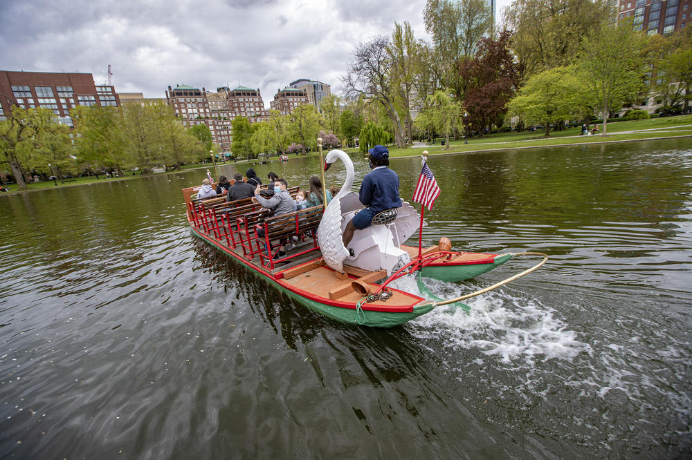 A swan boat full of riders embarks onto a pond at the Public Garden in Boston. The swan boats did not operate in 2020 because of COVID-19 restrictions. <a href=