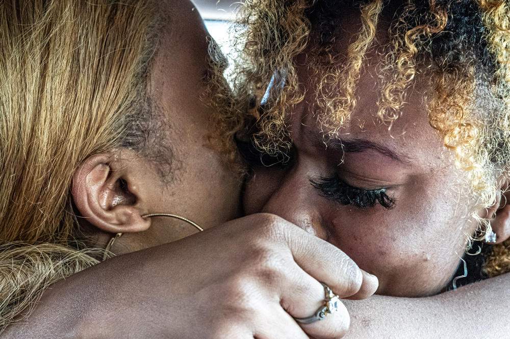 Abi Dwyer (left) and Gail Dwyer, both 25, are sisters with the same father but different mothers who were separated from one another for 15 years. Their first instinct when they reunited recently was to hug one another tightly and cry. No words were spoken for nearly five minutes.