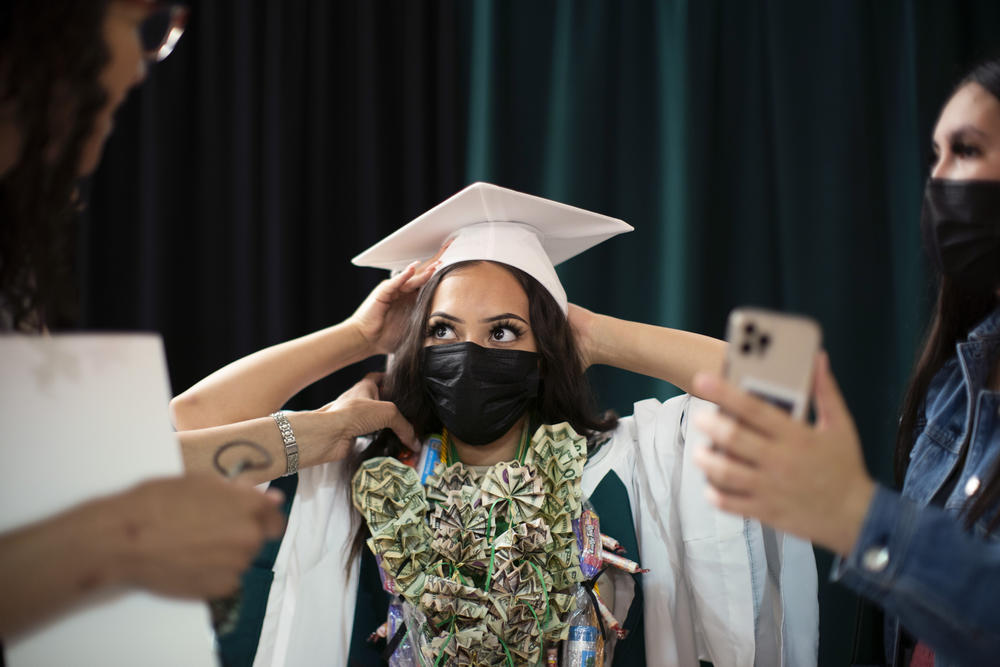 Cailyn Benson's personal graduation took place in Reynolds High School's multi-purpose room. Benson was sad she couldn't be with her friends, and she mourned the big, traditional ceremony they missed out on. 