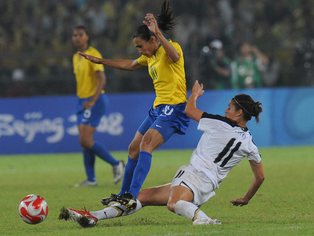 Lloyd has helped the U.S. women continue a dominant run on the world stage. She's seen here trying to spring the ball away from Brazil's Marta in the gold medal match of the 2008 Beijing Olympics.