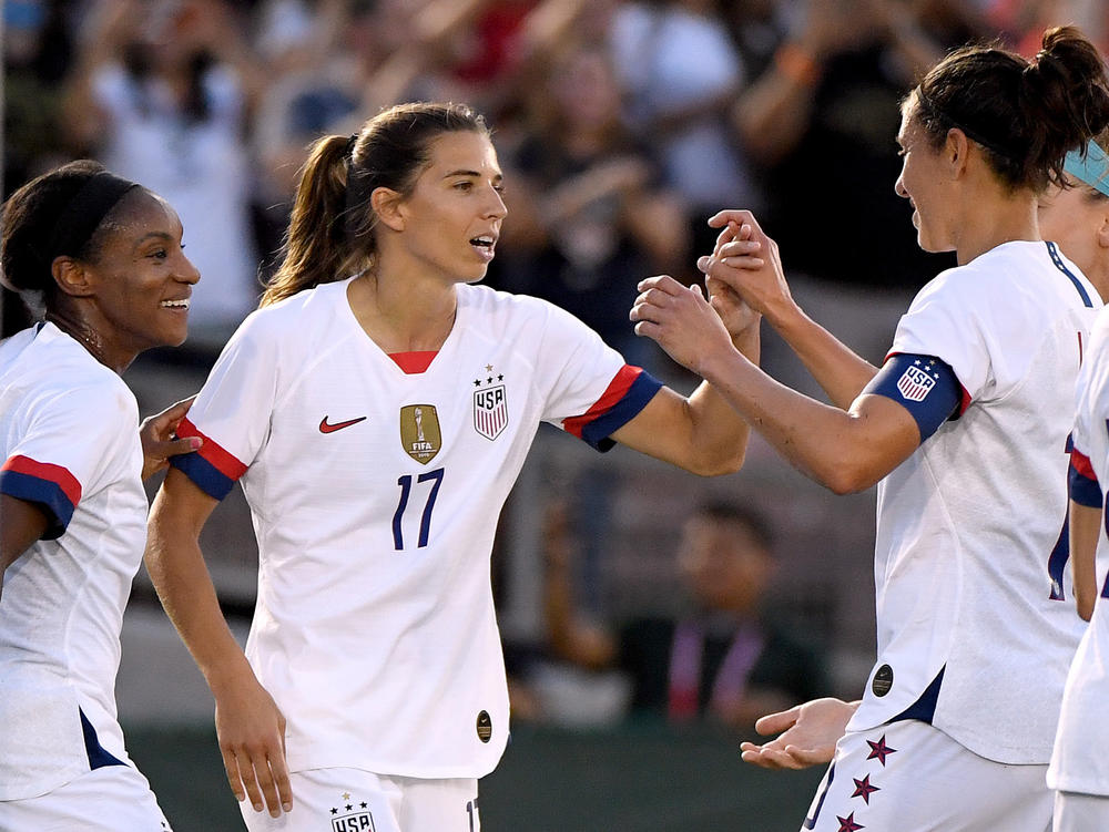 The U.S. women's national team is bringing a veteran roster to the Tokyo Olympics, including Crystal Dunn (left), Tobin Heath and Lloyd.