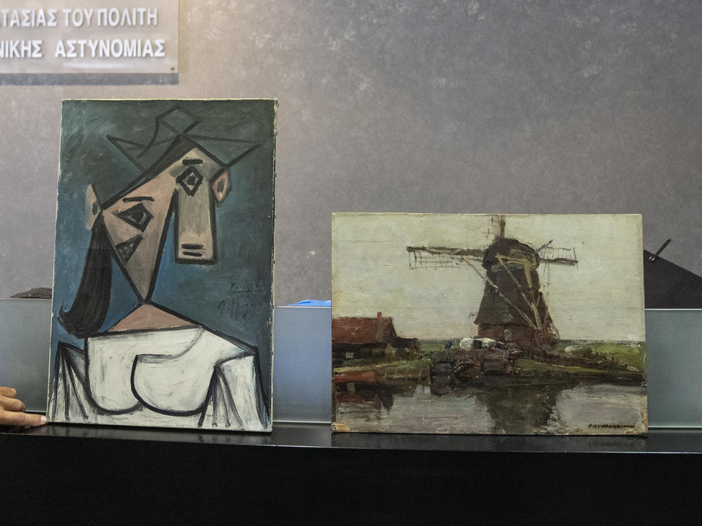 Greek police says they have recovered two paintings by 20th century masters Pablo Picasso and Piet Mondrian, nearly a decade after their theft from the country's biggest state art gallery in Athens.