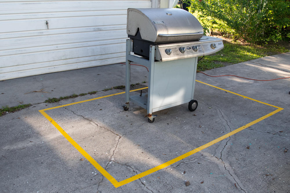 The National Fire Protection Association's Susan McKelvey recommends taping bright colored duct tape on the ground near a grill to mark off a boundary easily visible to children.