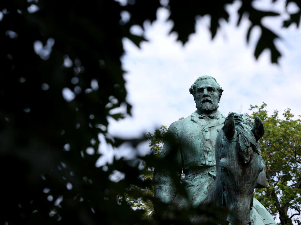 A statue of Confederate Gen. Robert E. Lee is shown in Market Street Park July 9, 2021 in Charlottesville, Va. The statute, along with another of Gen. Stonewall Jackson, will be removed Saturday.