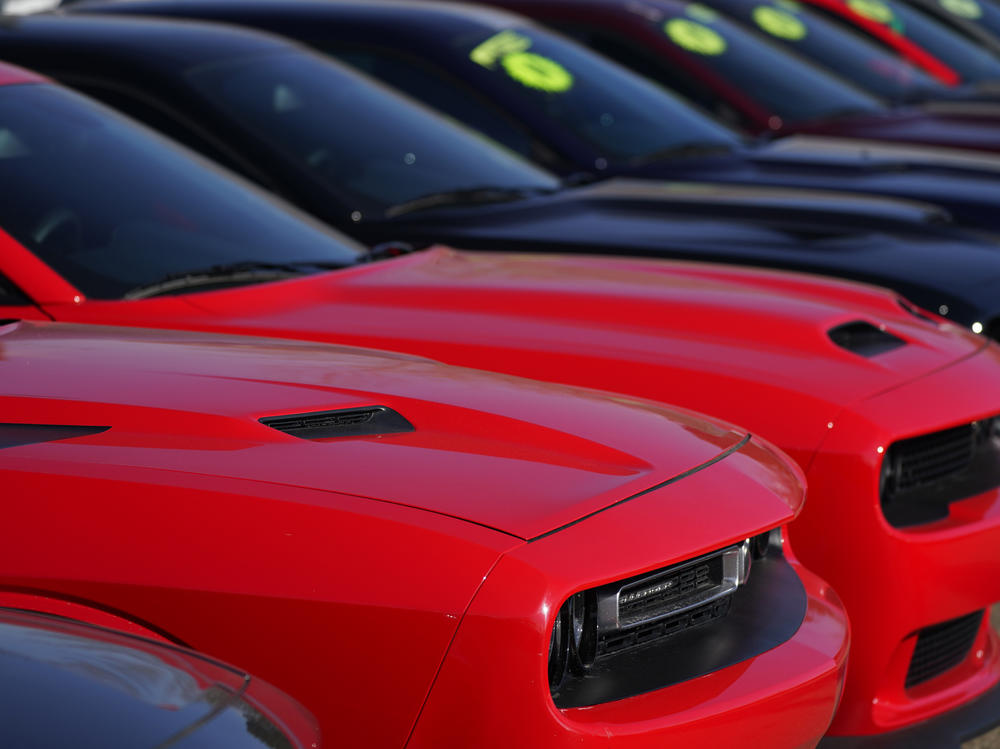 Used Challengers sit in a long line at a Dodge dealership on Jan. 24 in Littleton, Colo. Used car prices may be peaking and that could help reinforce hopes for easing inflation.