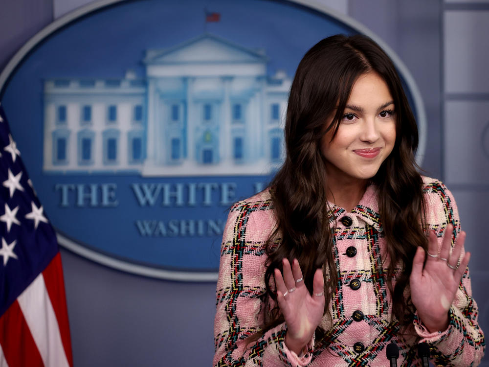 Pop star Olivia Rodrigo makes a brief statement to reporters Wednesday in the Brady Press Briefing Room at the White House.