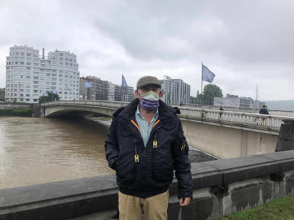 Pierre Fouillen, a lifelong resident of Liège, Belgium, came to the Meuse river to assess the flood damage. The 81-year-old says he's never seen such devastation.