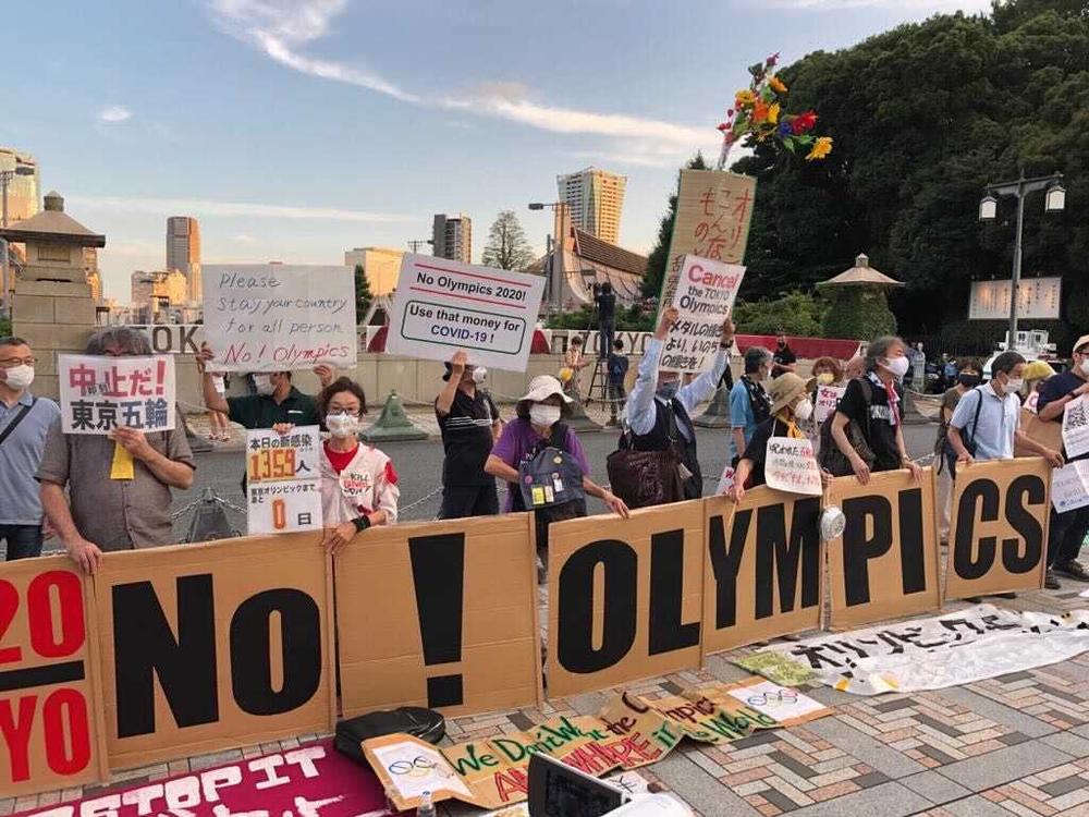 Demonstrators gather in Tokyo on Friday to protest the start of the Olympic Games.