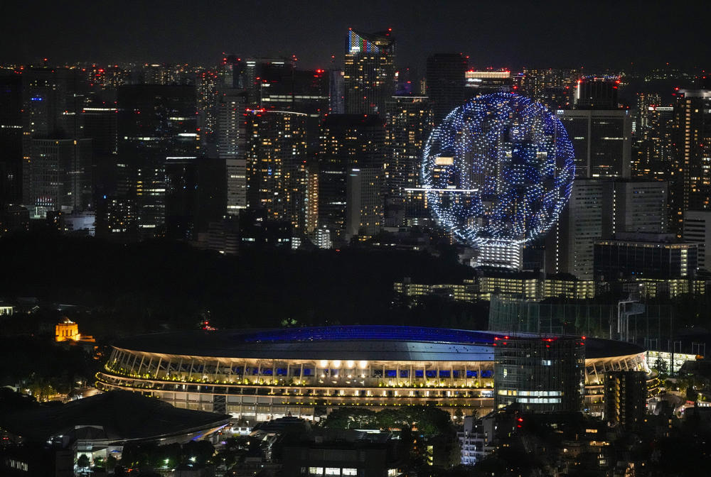 More than 1,800 drones form the shape of a globe during the opening ceremony.