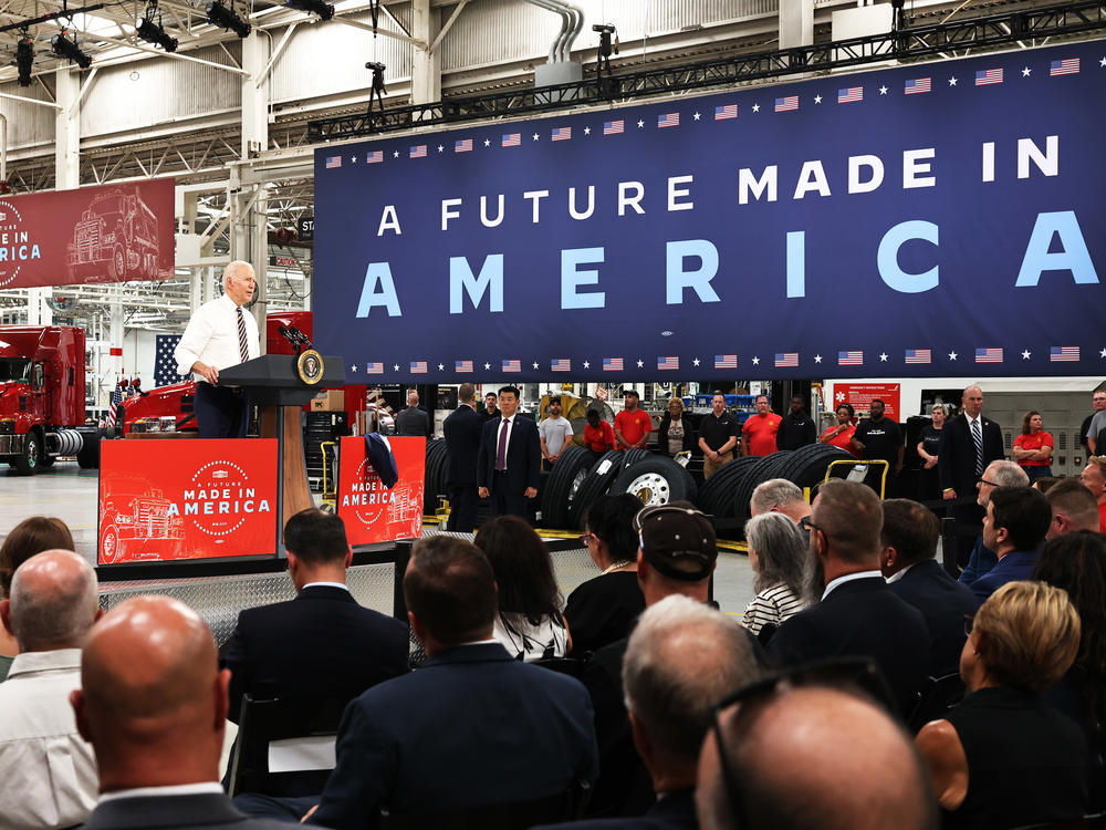 President Biden speaks Wednesday at a Mack Trucks facility in Macungie, Pa., about the importance of U.S. manufacturing and buying products made in America.