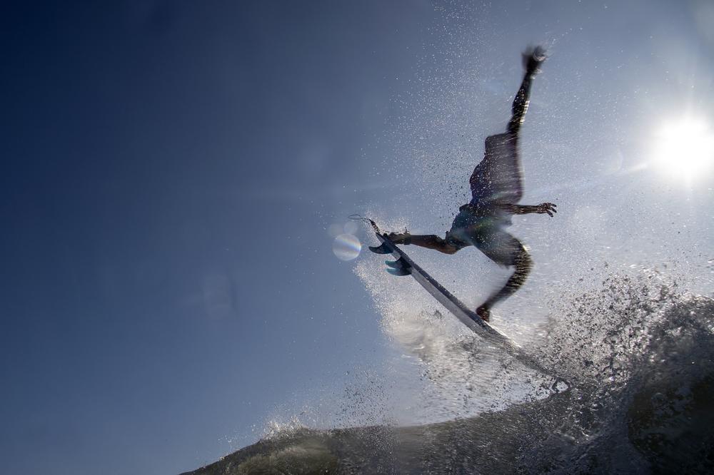 Brazil's Italo Ferreira rides a wave during the men's Surfing first round at the Tsurigasaki Surfing Beach, in Chiba, on July 25, 2021. Ferreira was the gold medal winner of the category.