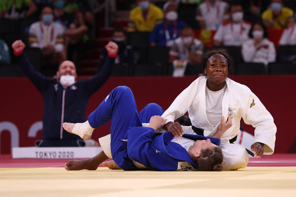 France's Clarisse Agbegnenou celebrates winning the judo women's 63kg gold medal bout against Slovenia's Tina Trstenjak  on July 27, 2021.