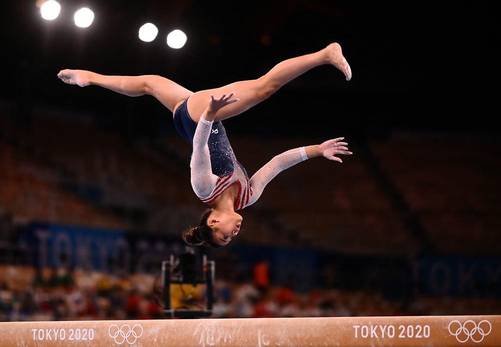 U.S.'s Sunisa Lee competes in the balance beam event of the artistic gymnastics women's all-around final to win the gold medal on July 29, 2021.