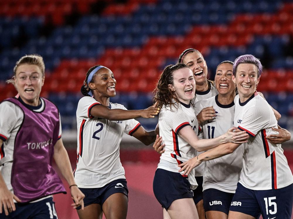 The U.S. team celebrates after winning the Tokyo 2020 Olympic Games women's quarter-final soccer match between Netherlands and the U.S. on July 30, 2021.