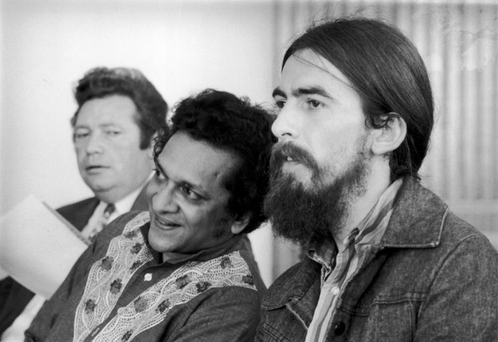 December 1971: Singer-songwriter George Harrison at the Royal Festival Hall with Indian sitar maestro Ravi Shankar, during the time Harrison helped to organize the 'Concert for Bangladesh'.
