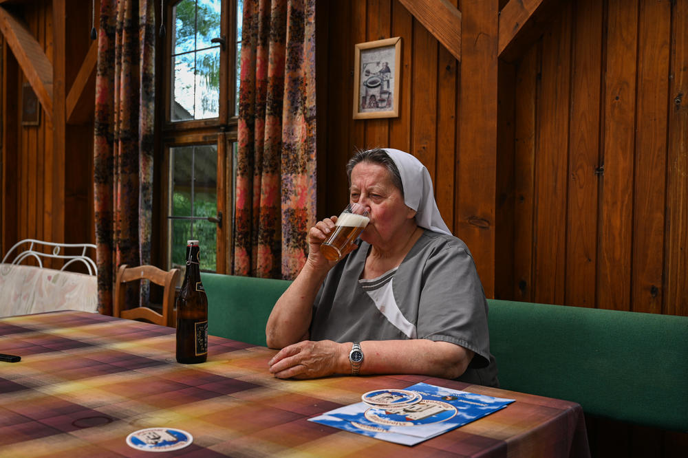 Sister Doris drinks her after work beer.