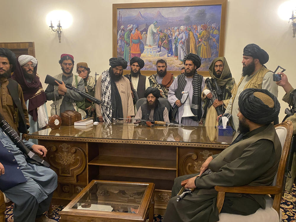 Taliban fighters take control of Afghan presidential palace in Kabul after the Afghan President Ashraf Ghani fled the country on Sunday.