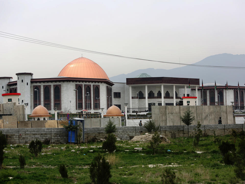 India financed construction of Afghanistan's parliament building, shown here after the Taliban claimed responsibility for firing a series of rockets at it in 2016.